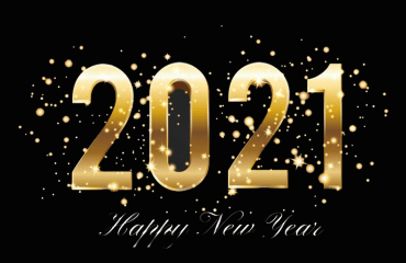 A black background with bold, gold sparkling text wishing a Happy New Year for 2021.