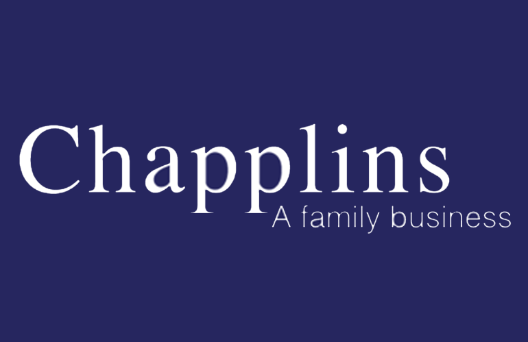 Logo for Chapplins: White text on a blue background.